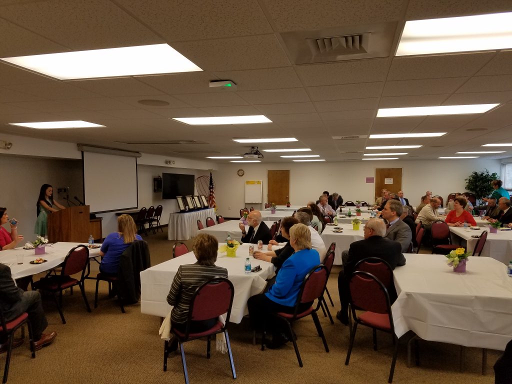 CTKG Elena stands in front of a crowd of teachers to talk about her role as CT Kid Governor.