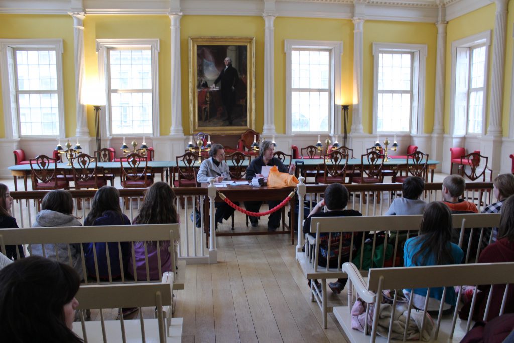 Students participate in a trivia challenge hosted by volunteers from Civics First.