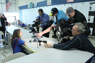 CTKG Elena surrounded by reporters