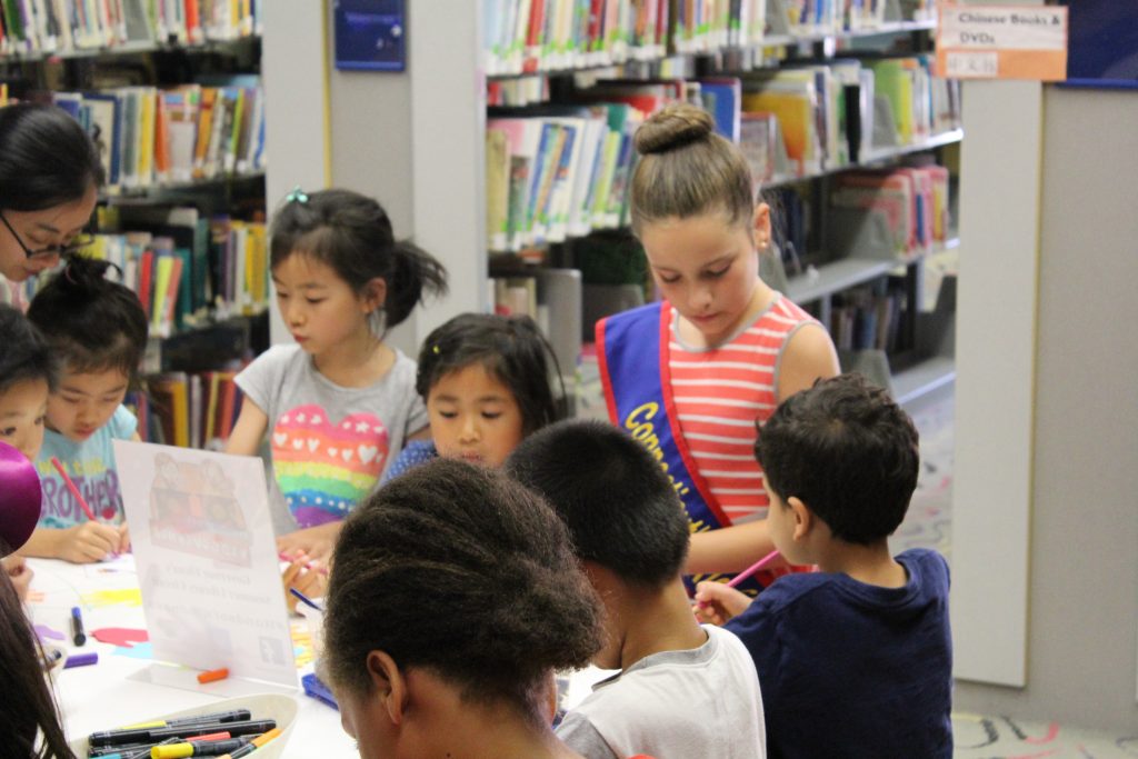 CTKG Elena works with children on a kindness activity.